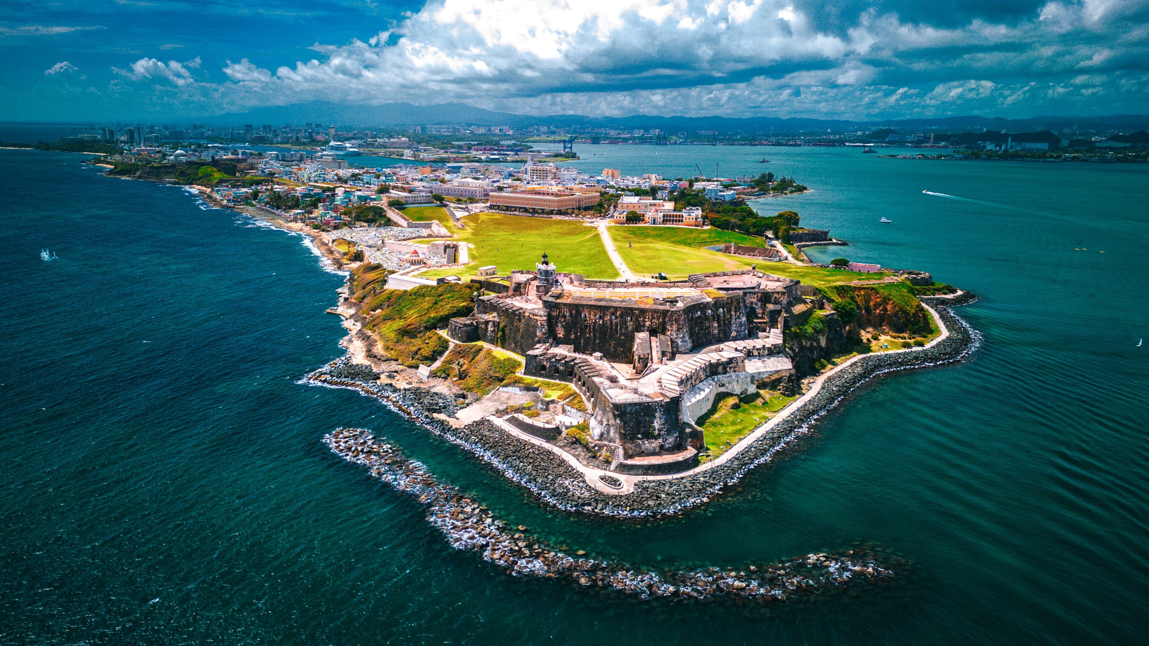 El Morro on the headland from the air, with Old San Juan and the bay stretching out behind it